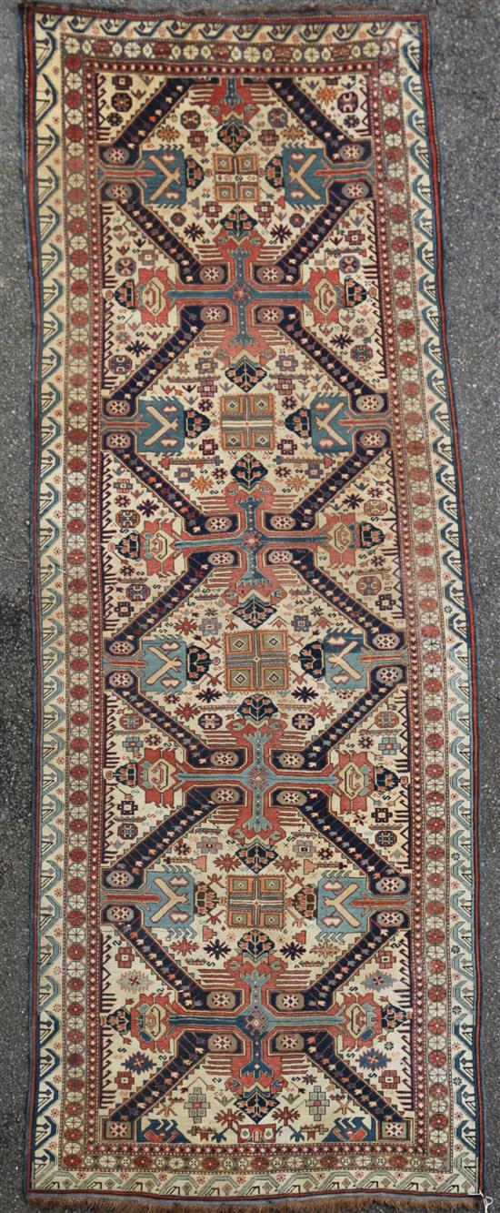 A Seichur ivory ground runner, c.1890, 10ft 9in by 3ft 11in.